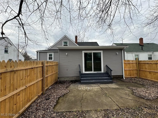 back of house featuring a patio