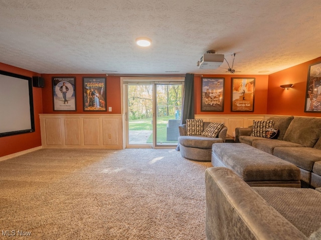 carpeted living room featuring a textured ceiling