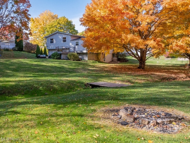 view of yard featuring a deck