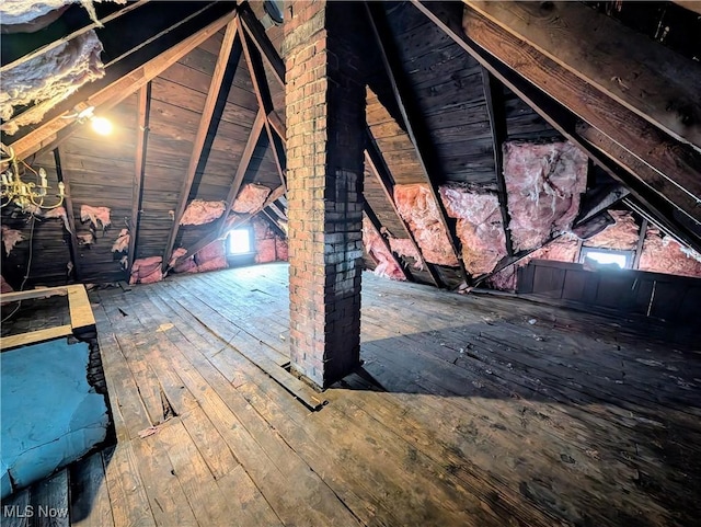 attic featuring plenty of natural light