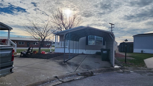 view of front of house with a carport