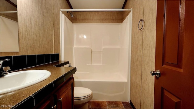 full bathroom featuring shower / bathing tub combination, vanity, and toilet