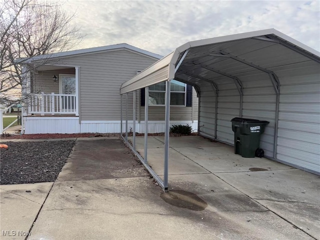 view of parking / parking lot with a carport