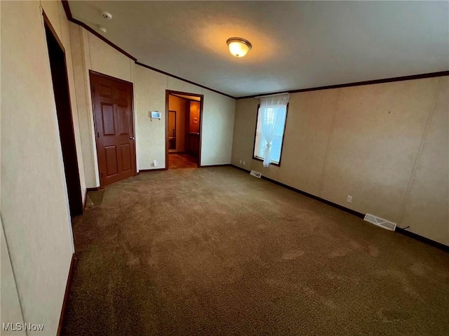 unfurnished bedroom featuring carpet flooring and crown molding