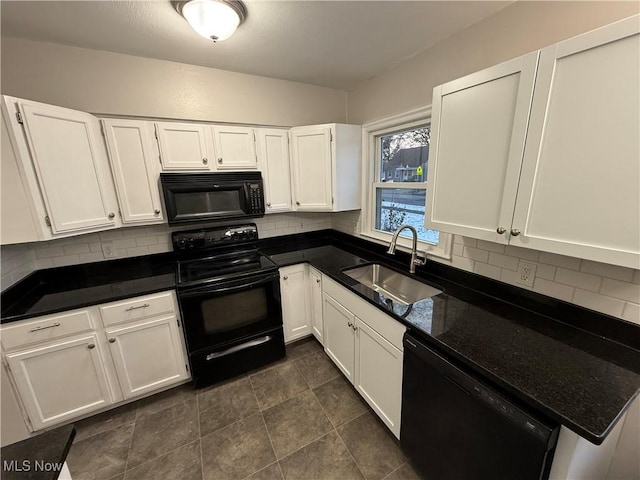 kitchen featuring white cabinets, sink, backsplash, and black appliances