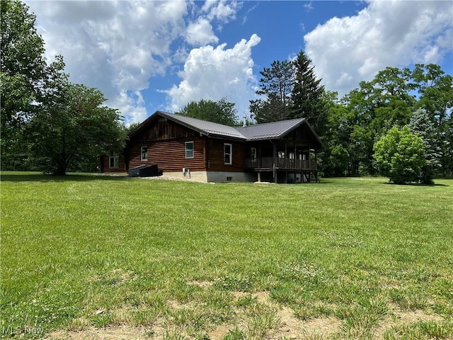 exterior space featuring a lawn