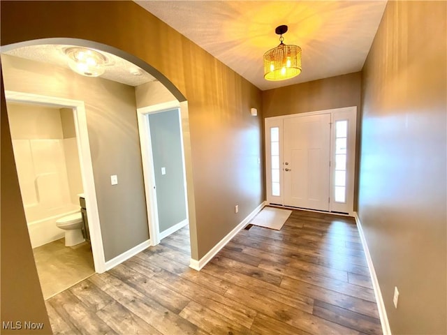 foyer entrance featuring hardwood / wood-style flooring