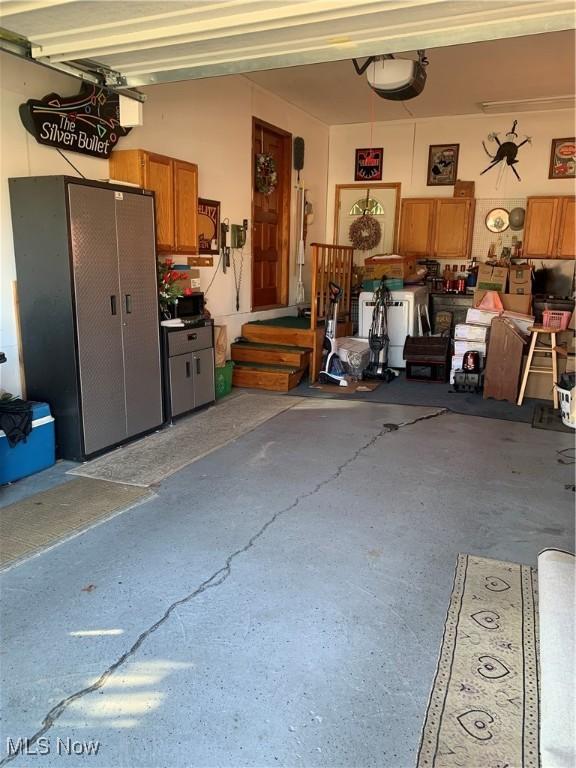 garage featuring a garage door opener