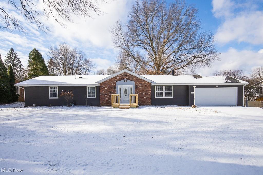 ranch-style home with a garage