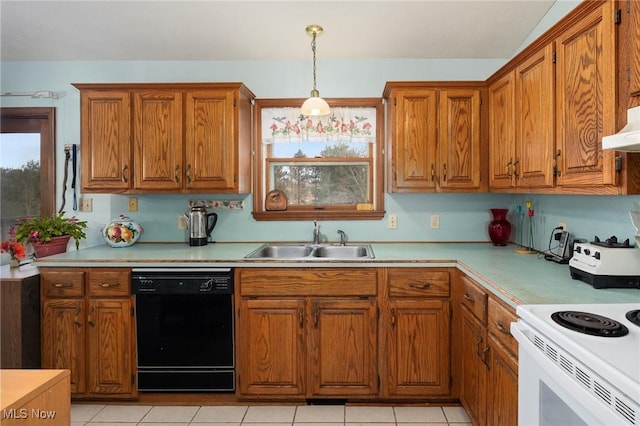 kitchen with dishwasher, pendant lighting, light tile patterned flooring, and sink