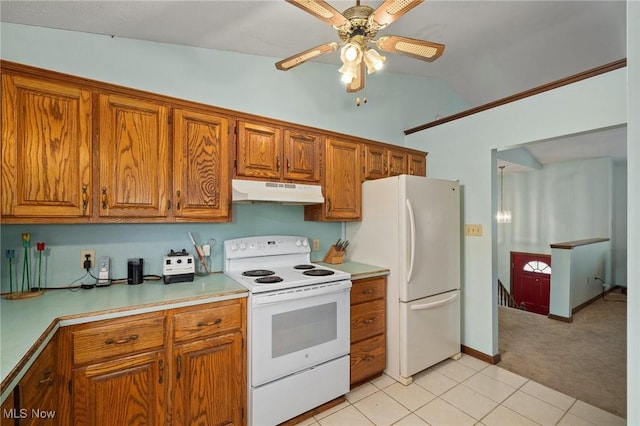 kitchen featuring vaulted ceiling, ceiling fan, light colored carpet, and white appliances