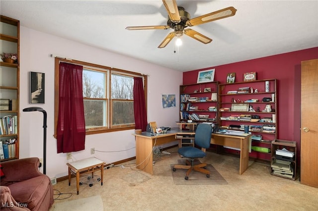 office featuring light carpet and ceiling fan