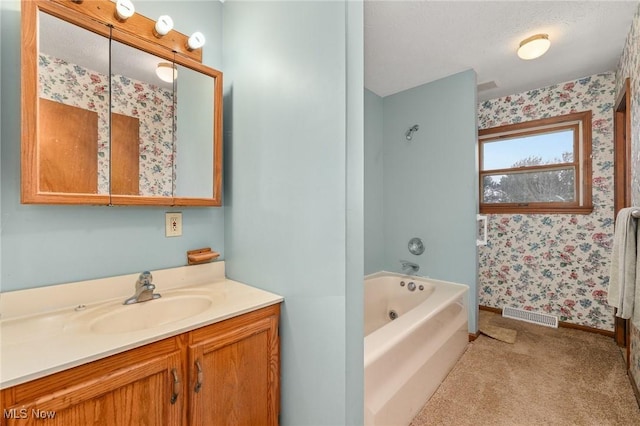 bathroom featuring vanity and a textured ceiling