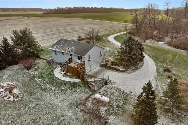 birds eye view of property with a rural view