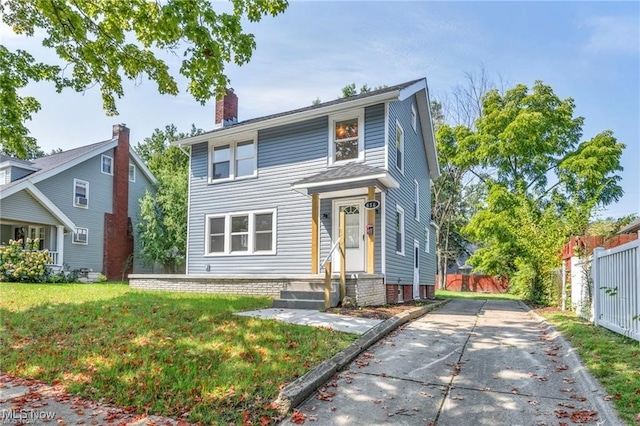 view of front property with a front yard