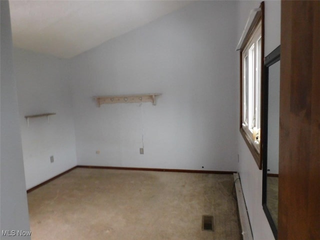 unfurnished room with a healthy amount of sunlight and light carpet