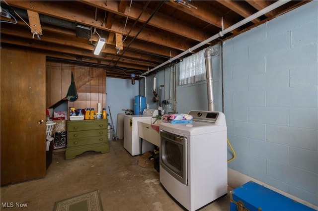 laundry room with independent washer and dryer