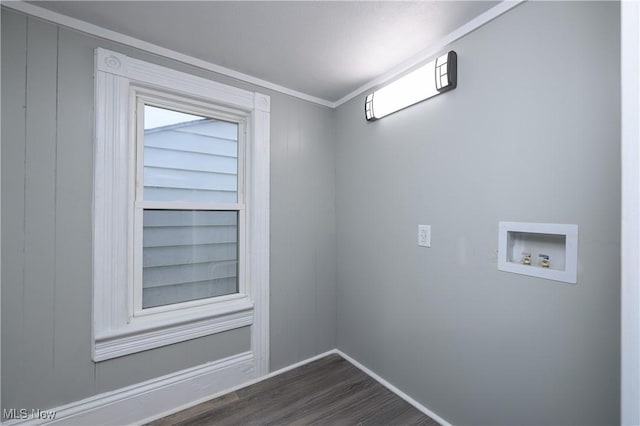 laundry room featuring built in features, hookup for a washing machine, dark hardwood / wood-style floors, and ornamental molding