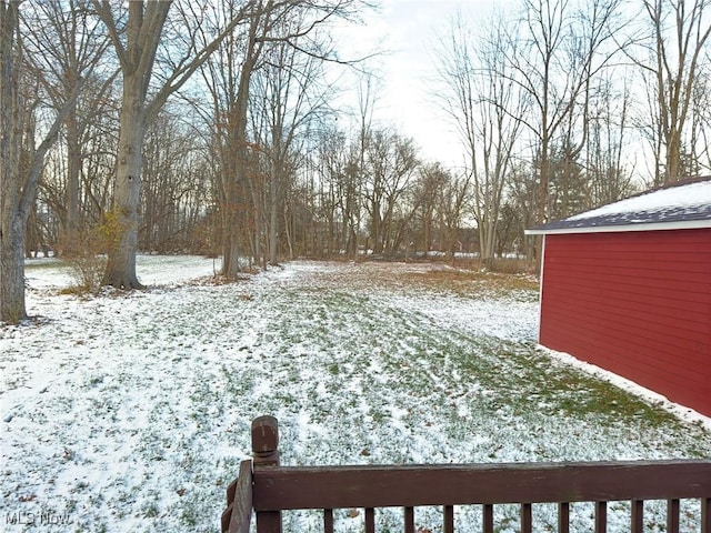 view of yard covered in snow