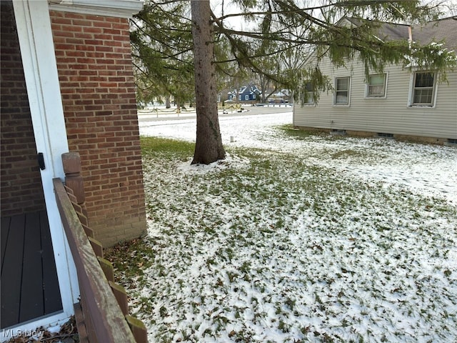 view of snowy yard