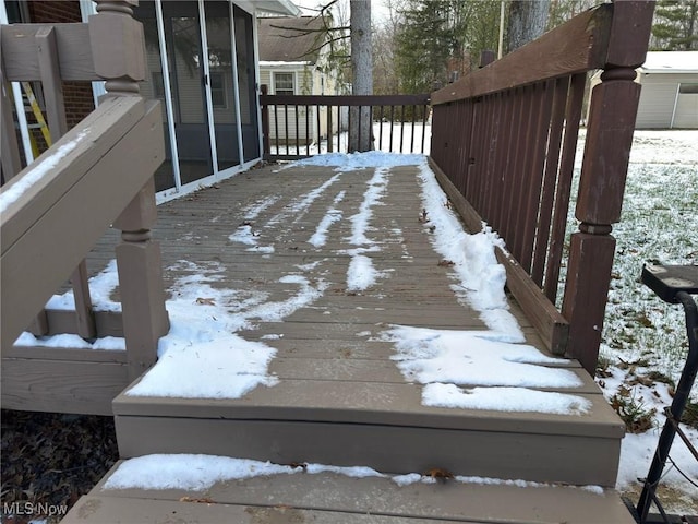 view of snow covered deck