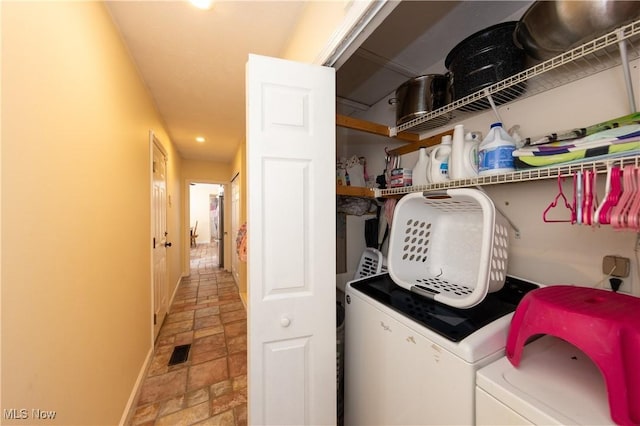 laundry area featuring washing machine and dryer