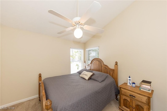 bedroom featuring ceiling fan, light carpet, and lofted ceiling