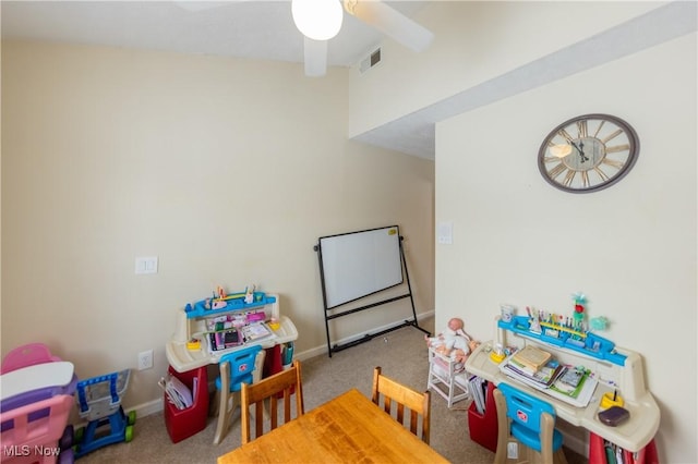 playroom featuring ceiling fan and carpet floors