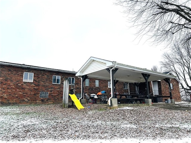 view of snow covered property