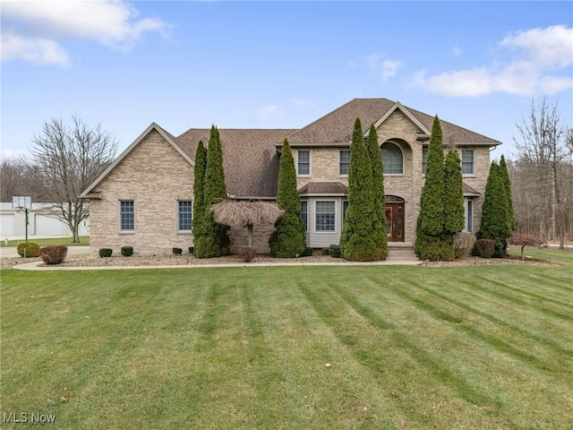 view of front of home with a front yard