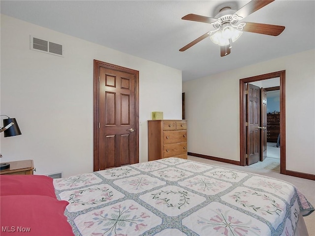 carpeted bedroom featuring ceiling fan