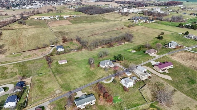 birds eye view of property featuring a rural view