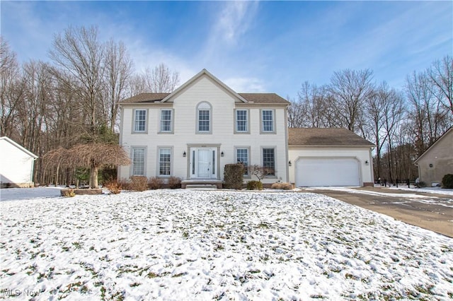 colonial-style house with a garage