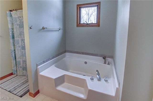 bathroom featuring shower with separate bathtub