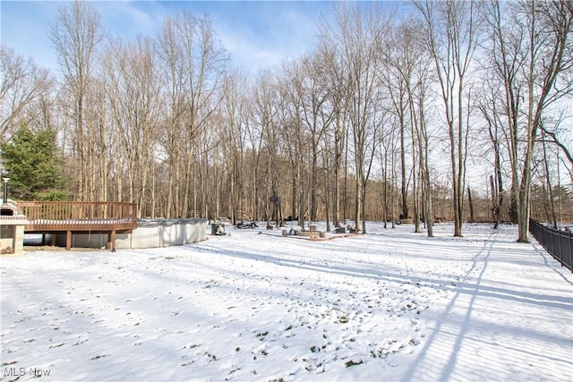 view of yard covered in snow