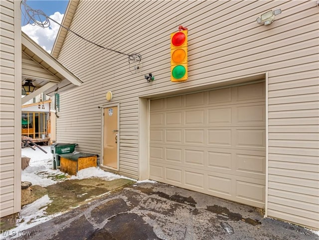 view of snow covered garage