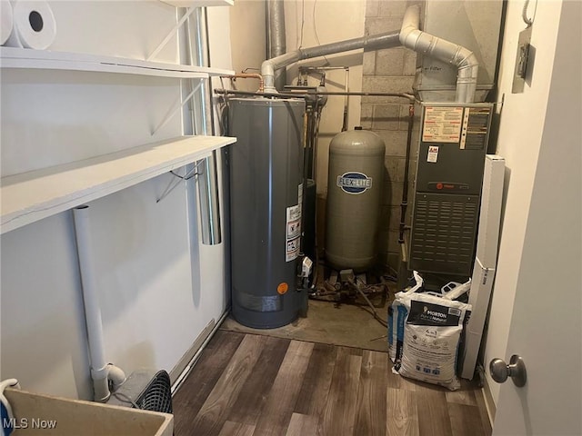 utility room featuring water heater