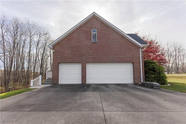 view of home's exterior with a garage