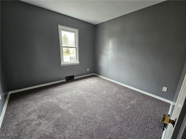 view of carpeted spare room