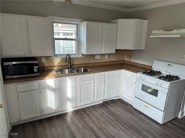 kitchen featuring white range with gas cooktop, white cabinetry, and sink