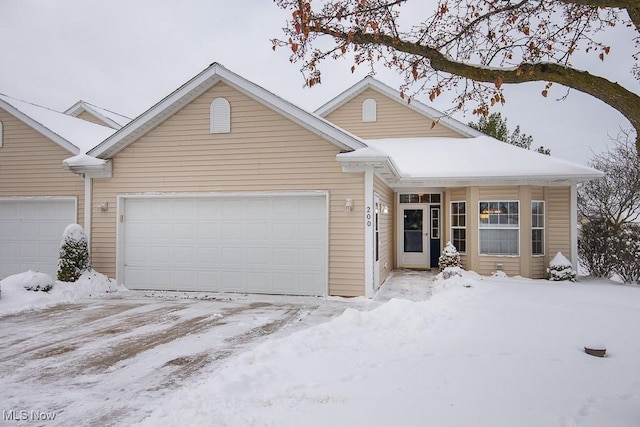 view of front of property with a garage