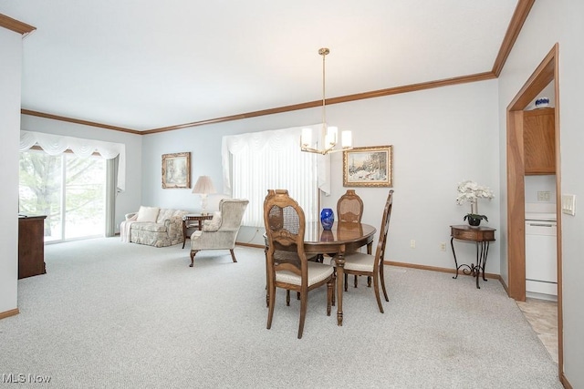 dining area with light carpet, a chandelier, and ornamental molding