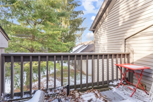 view of snow covered deck