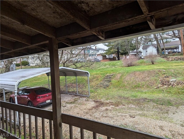 view of yard with a carport