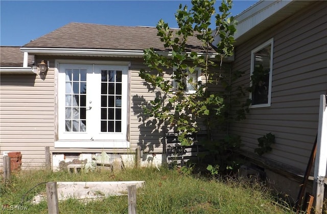 view of side of home with french doors