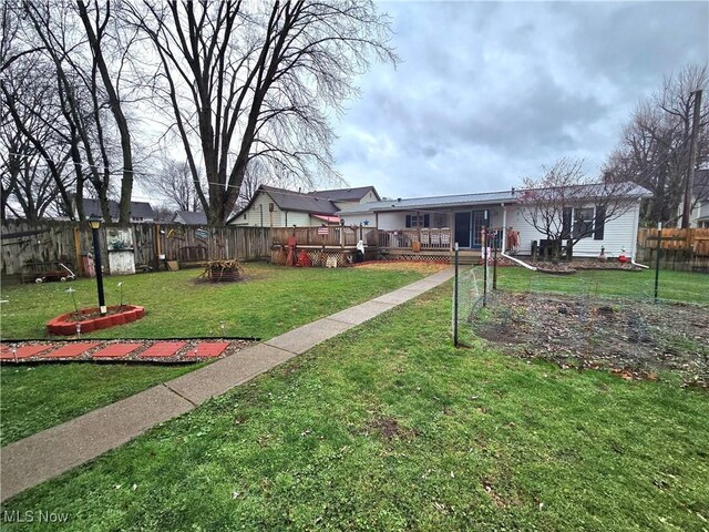 view of yard with a deck