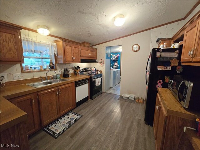 kitchen featuring sink, dark hardwood / wood-style floors, white dishwasher, a textured ceiling, and electric stove