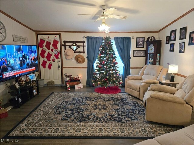 living room featuring ceiling fan, crown molding, and wood-type flooring