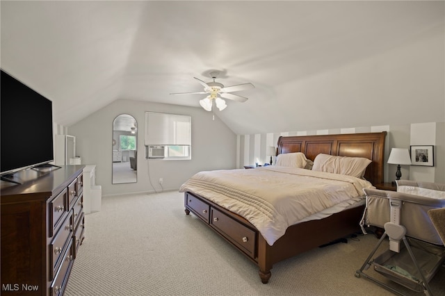 carpeted bedroom with ceiling fan, cooling unit, and vaulted ceiling