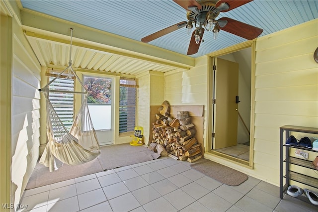 exterior space featuring ceiling fan